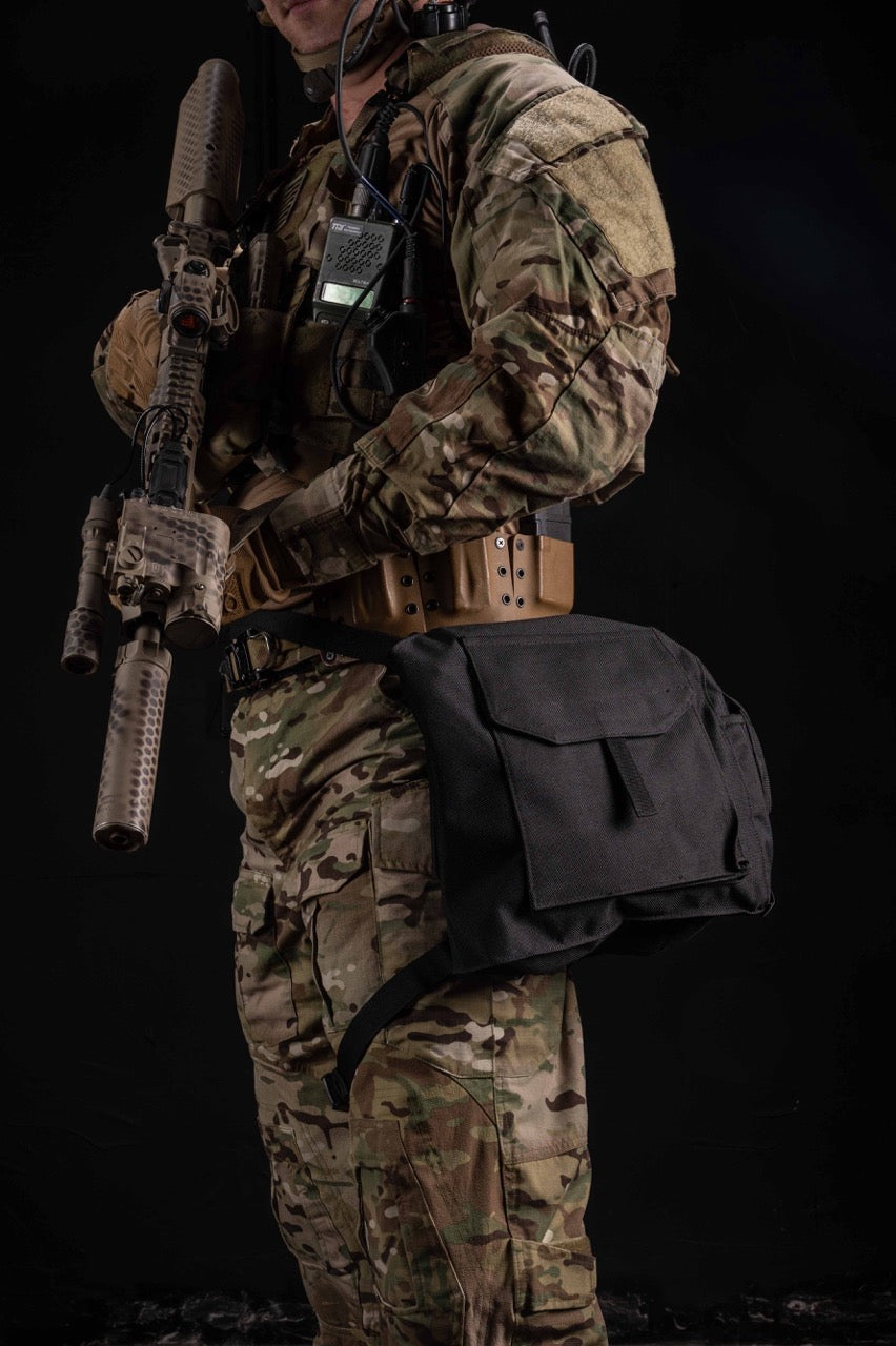 Soldier wearing the AirBoss LBM gas mask carrying case.