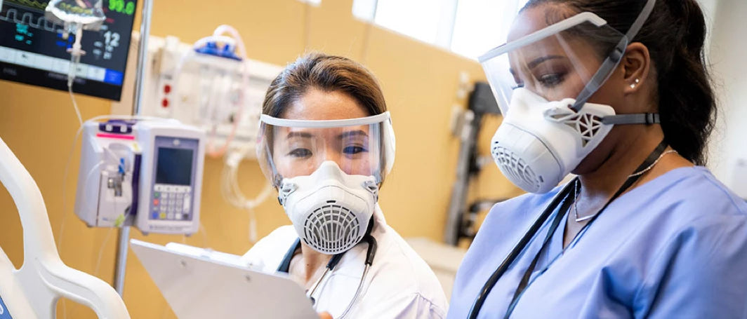 Medical staff wearing AirBoss 100 respirators